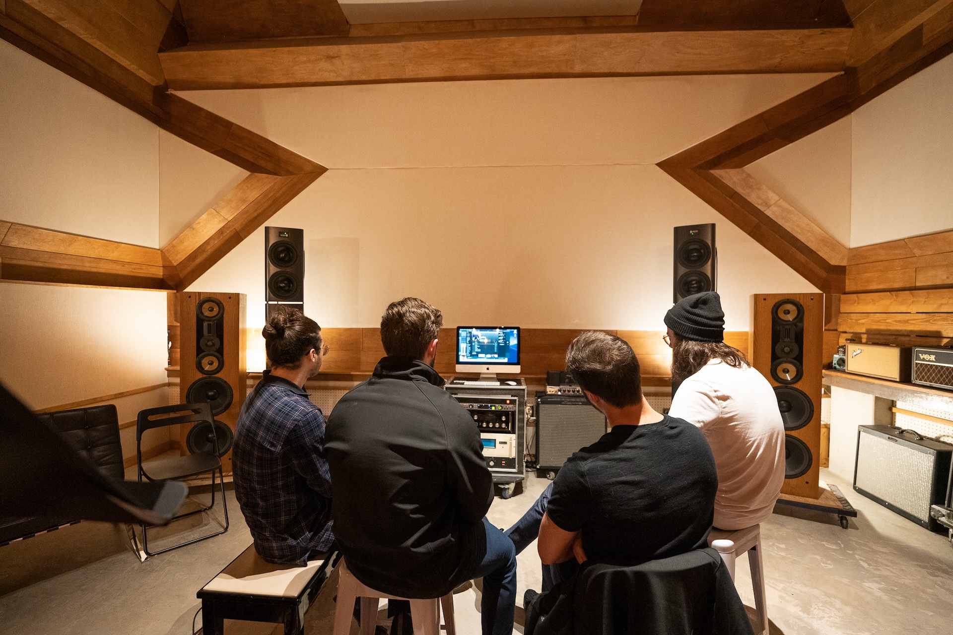 The OWEP production team working together in a production meeting