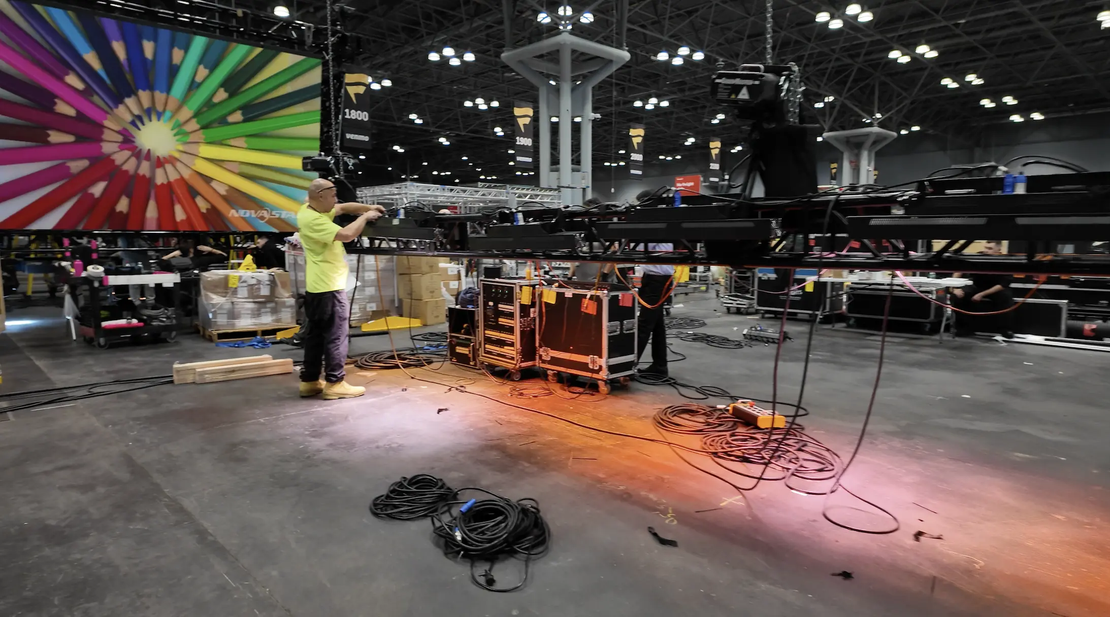 A team setting up a trade show booth
