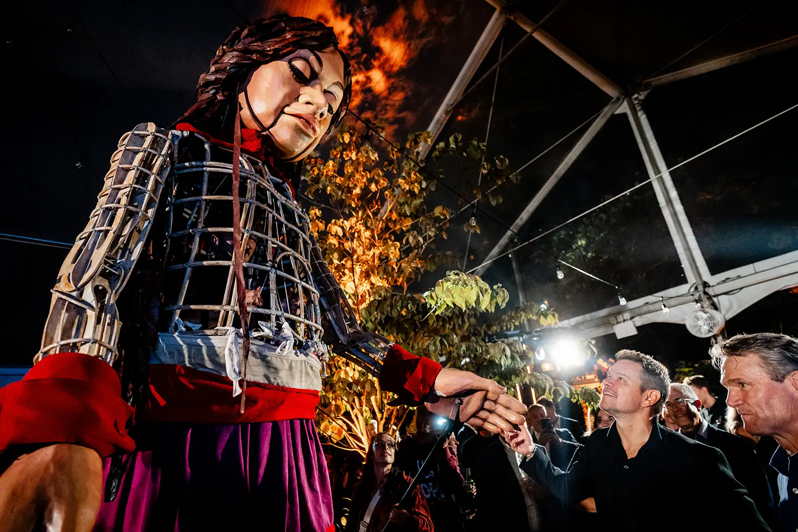 A giant roaming puppet at a live event