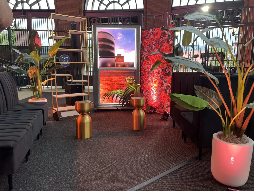 An LED totem made to look like the view from a NYC apartment window during a trade show